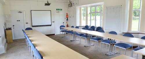 Oak room set up for a conference