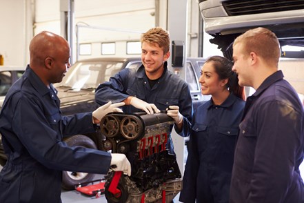 Students participating in an automotive work experience placement.