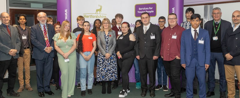 Group of young people who won awards standing proudly