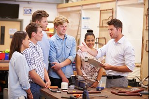 Employer talking to a group of work experience students.