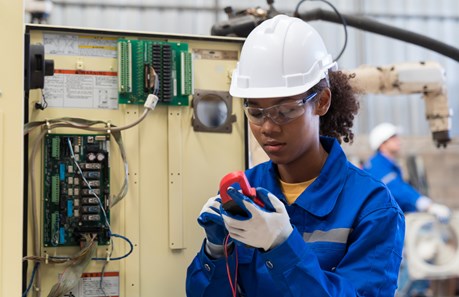 Young woman of colour working as an engineer