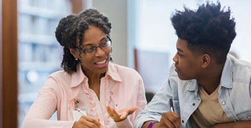 Careers advisor talking to a young person