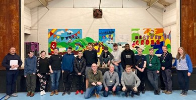 Young people gathered at Waltham Cross Young People's Centre with SfYP staff and contractors to discuss ideas for development of the space.