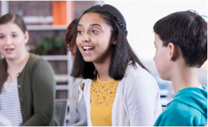 Young people sitting in a group and talking.