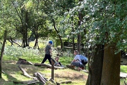 Families enjoying a Family Forest School at Hudnall Park.